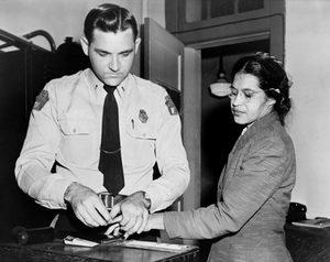 Rosa Parks is fingerprinted at a police station after her arrest in Montgomery, Alabama.