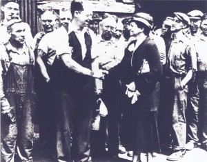 Perkins with steel workers
