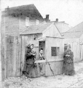 Temperance Crusaders watching the rear of a saloon in Mount Vernon, Ohio during the Crusade of 1873-1874