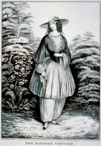 Illustration of a woman wearing bloomers under a short dress along with a stylish hat