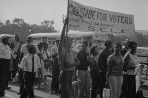 >Marchers with SCLC sign for the Savannah Freedom Now Movement, during the March on Washington, 1963