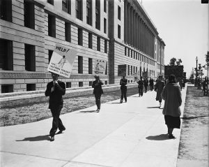 Picketers with signs: "Help the Southern Tenant Farmers Union," etc., 1935